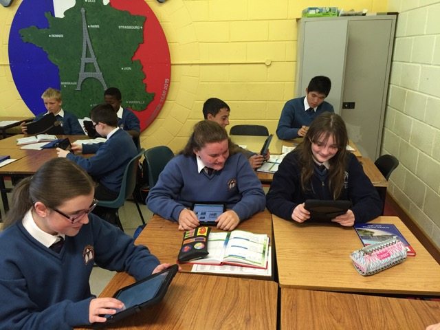 Some of the First Years explore their iPads in French Class